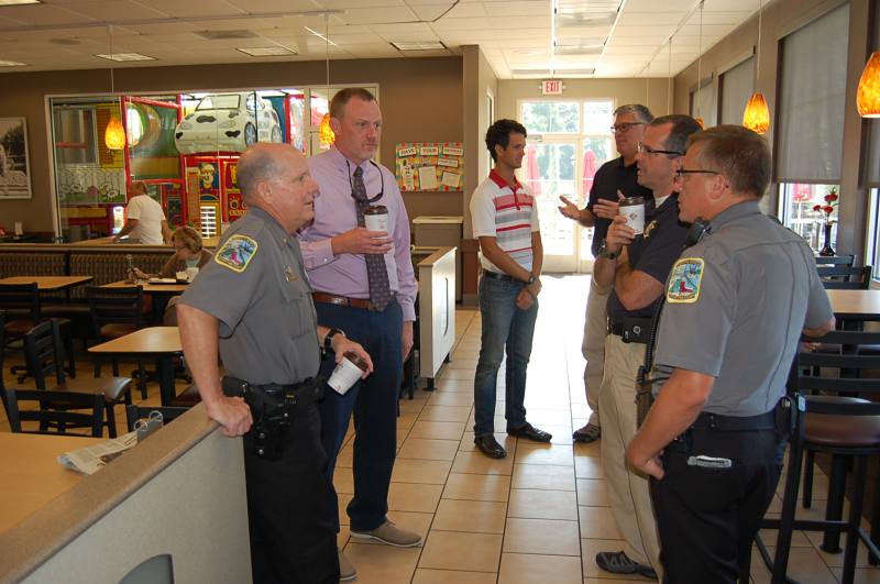 Deputies and Citizens in a coffee shop talking