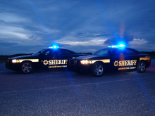 Two Sheriffs Office patrol Vehicle at night